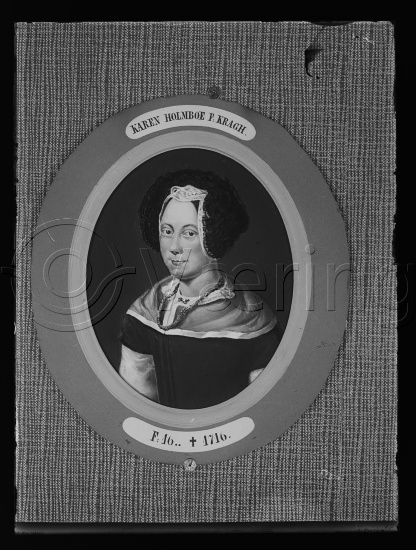 I fotoeske med teksten Holmboe-familien