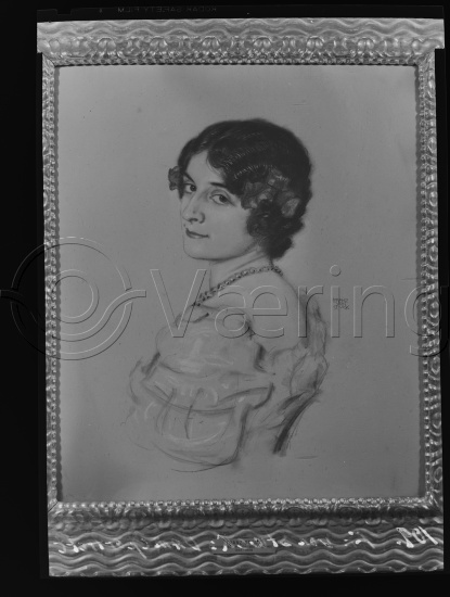 I fotoeske med tekst M. Reuch