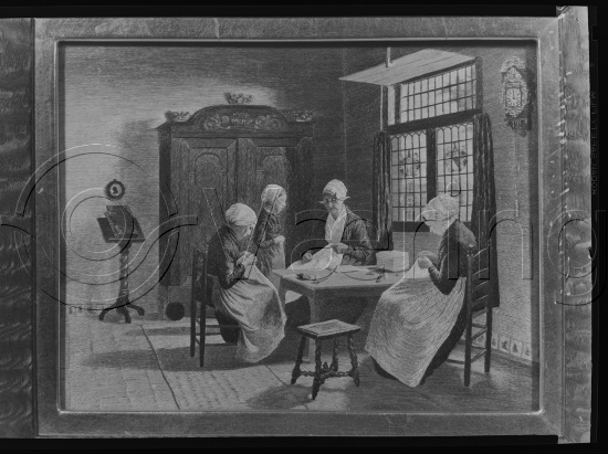 I fotoeske med tekst M. Reuch