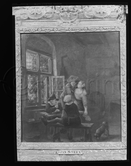 I fotoeske med tekst M. Reuch