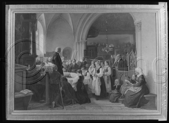 I fotoeske med tekst M. Reuch