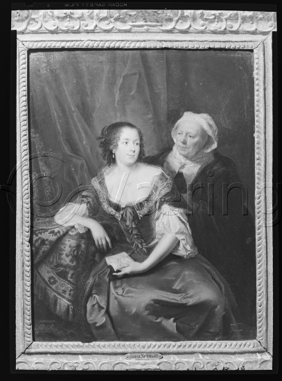 I fotoeske med tekst M. Reuch