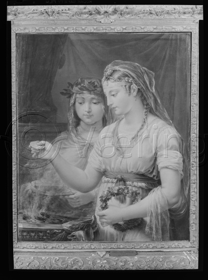 I fotoeske med tekst M. Reuch