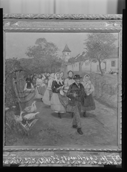 I fotoeske med M. Reuch