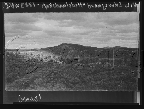 I fotoeske med ulike danske kunstnere